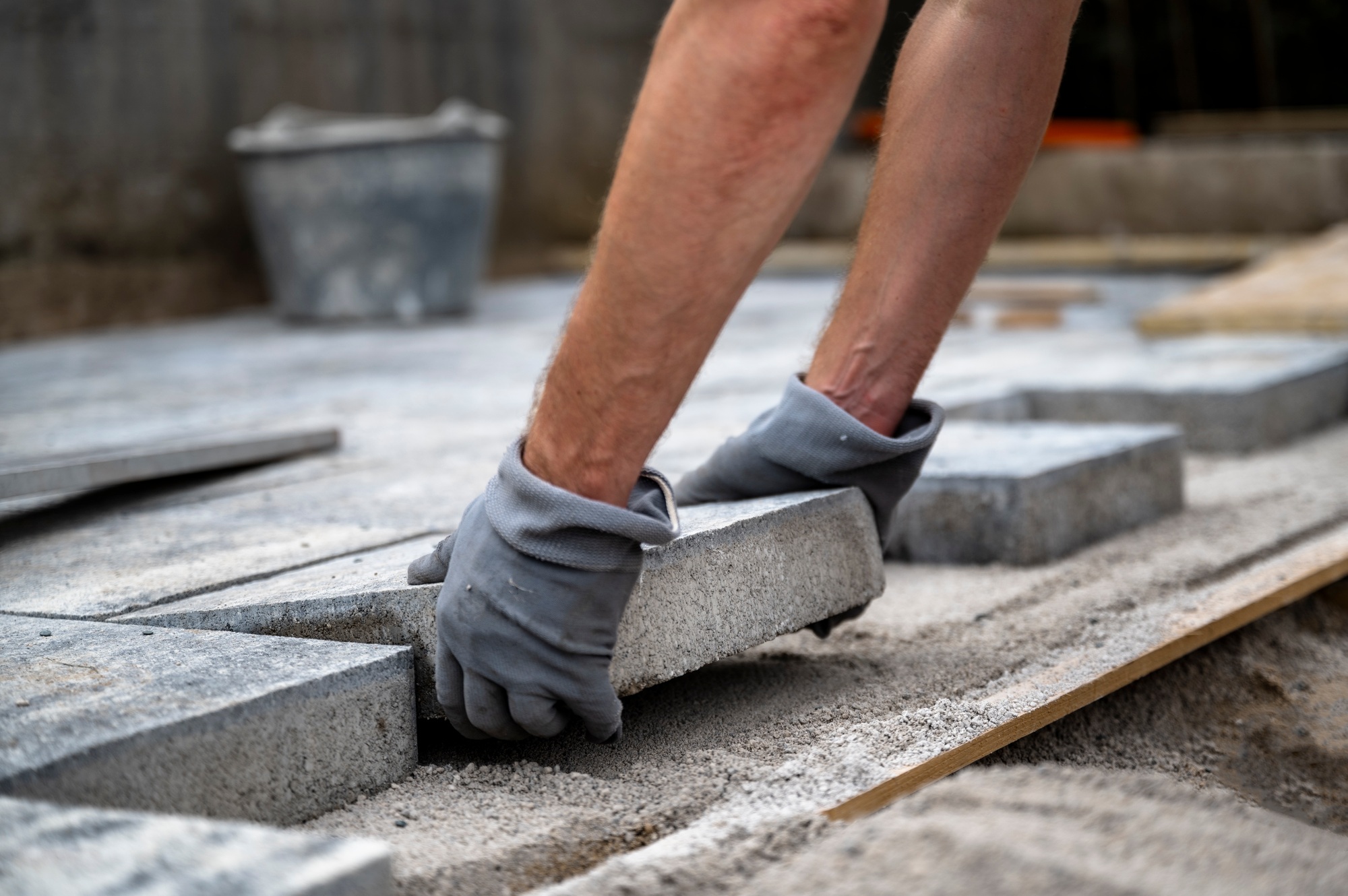 Contractor installing tiles
